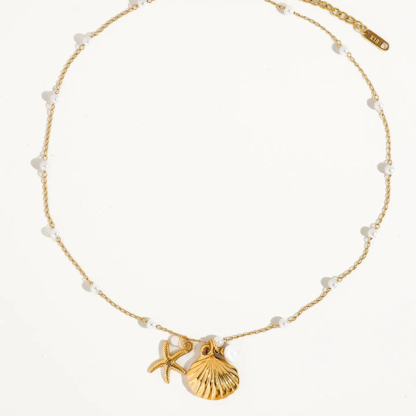 Flanerie: Capella Seashell & Sea Star Pearl Necklace