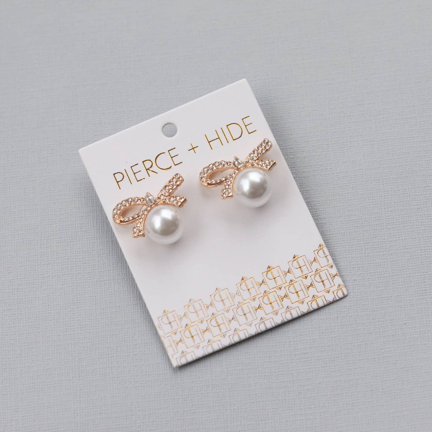 Pierce + Hide: Pearl Bow Statement Stud