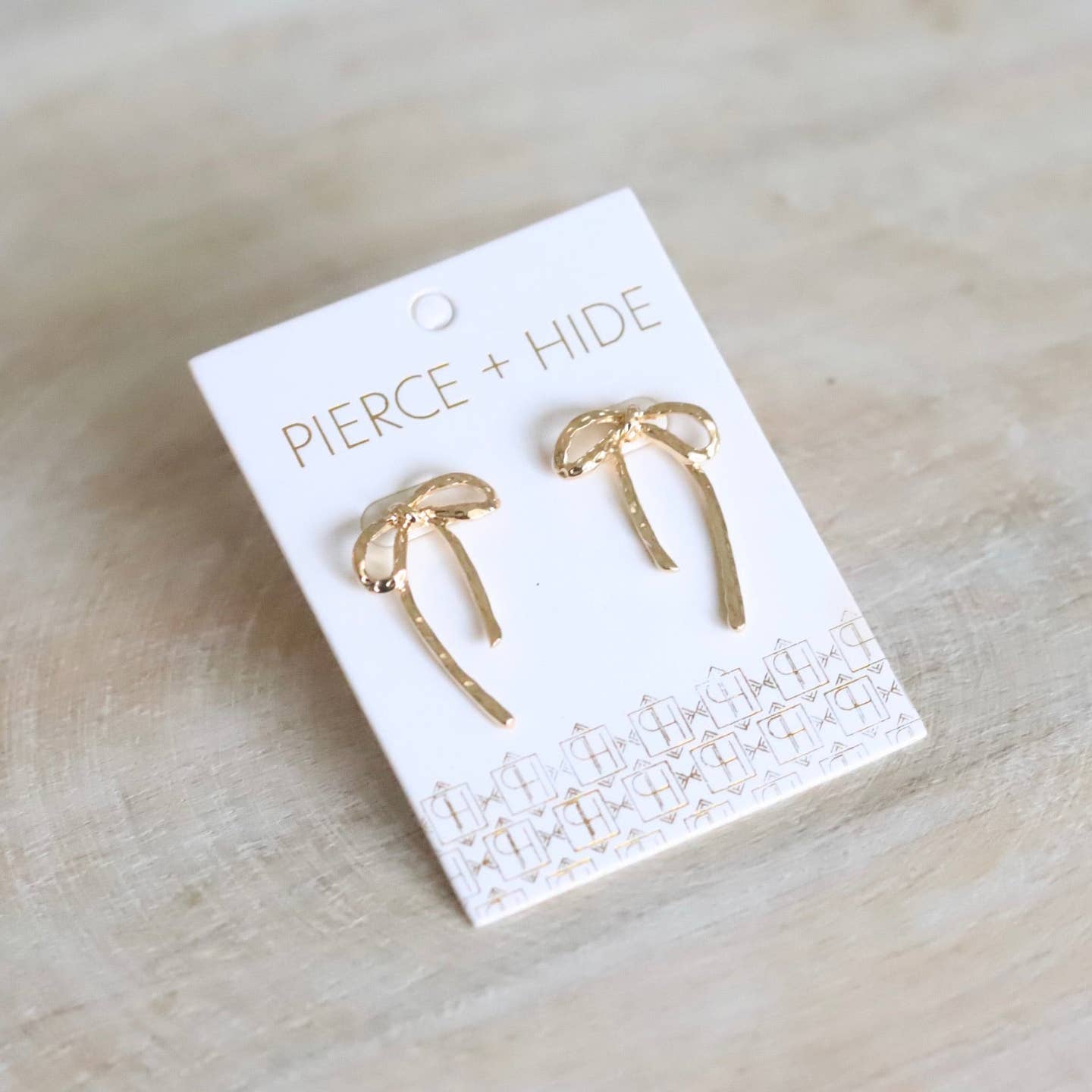 Pierce + Hide: Textured Ribbon Drop Earrings