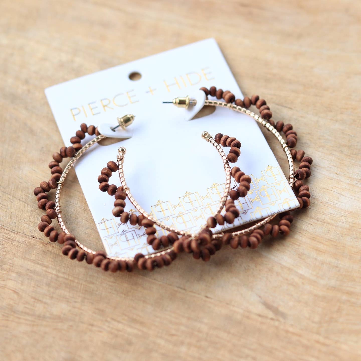 Pierce + Hide: Brown Wood Beaded Wrapped Hoop Earrings